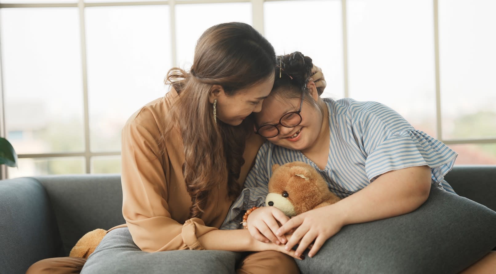 IMAGE Mother SEND daughter smiling.ls