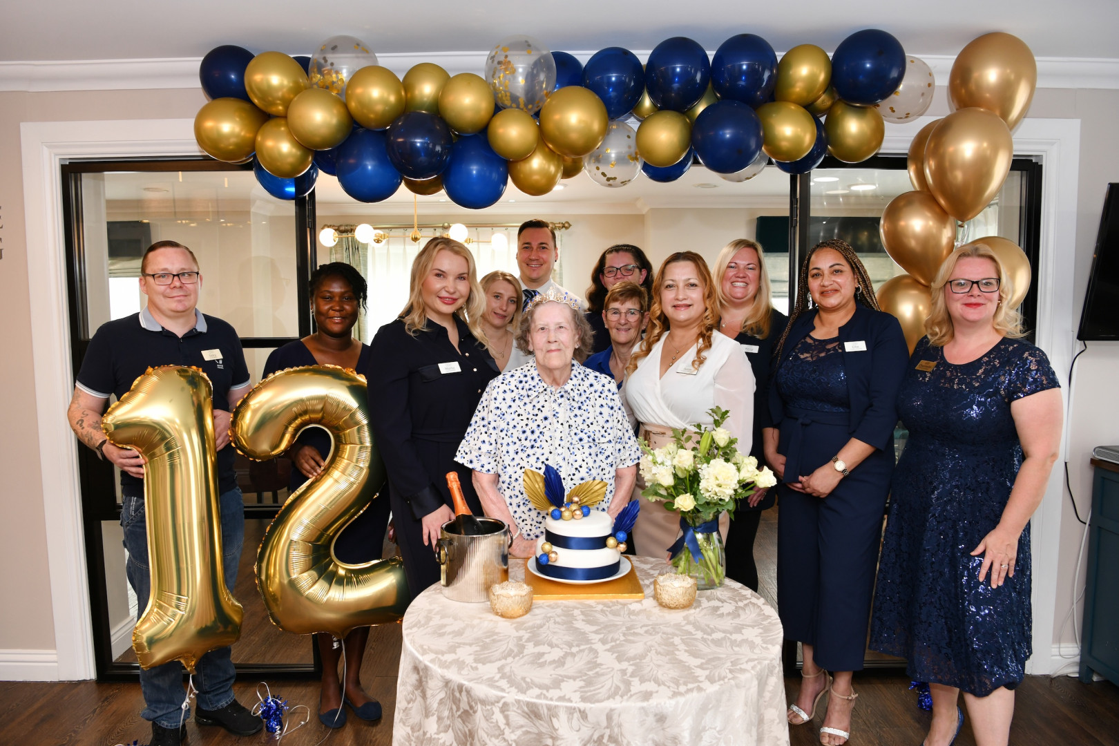 Bridge House team and Jean on 12th birthday